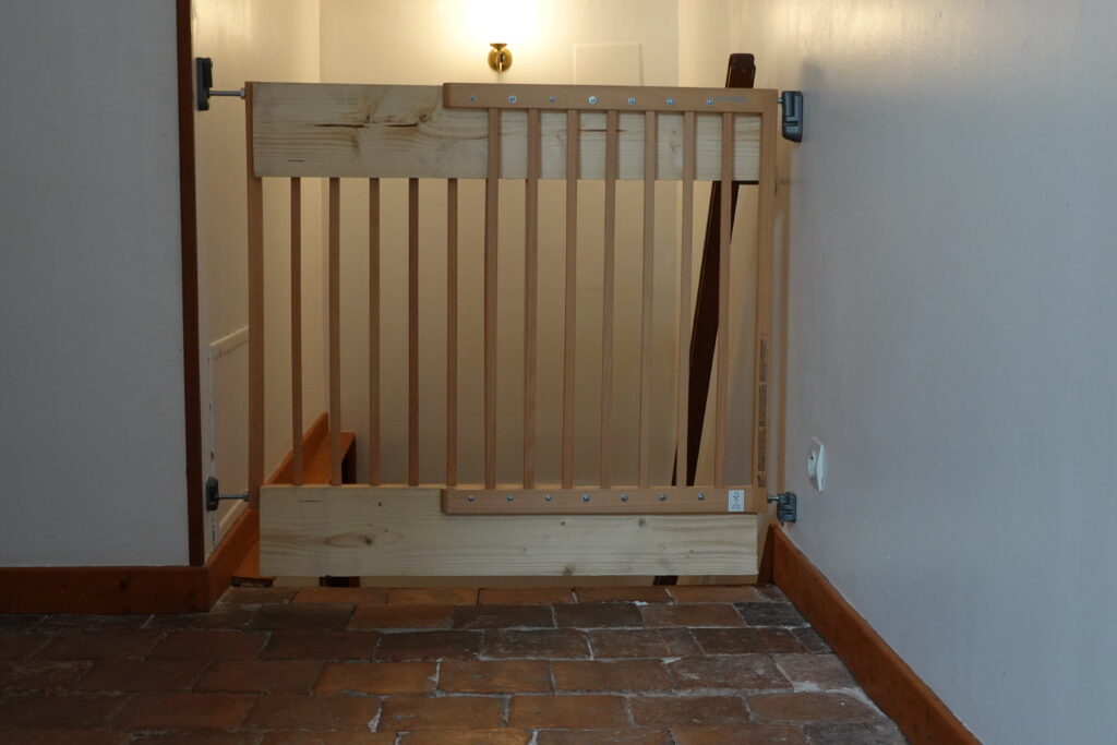 Baby gate on the first floor of the gîte